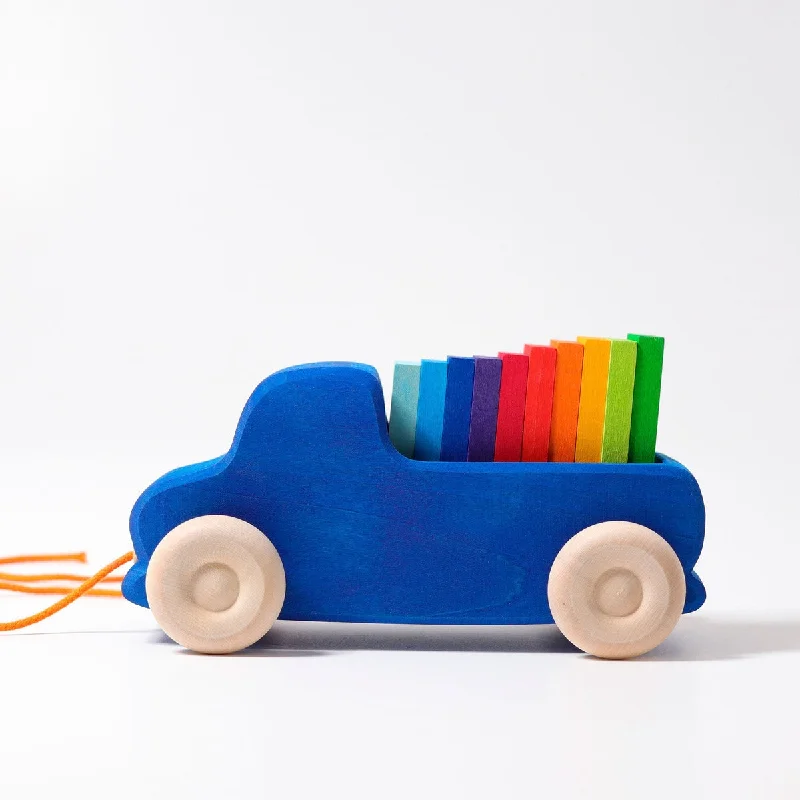 Grimm's blue truck pull toy with blocks